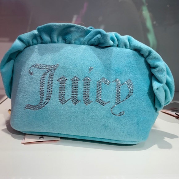 Juicy Couture Handbags - Juicy Couture Turquoise Cosmetic Bag